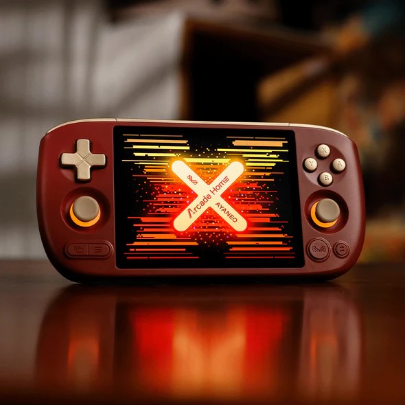 Ayaneo Pocket Air Mini Arcade Home Limited Edition kırmızı bir kabuğa ve altın rengi kontrollere sahiptir.