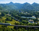 Jurassic World Evolution'daki bir parkı gösteren bir görüntü.