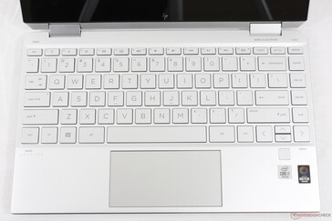 The gray font doesn't contrast very well against the silver key caps and palm rests