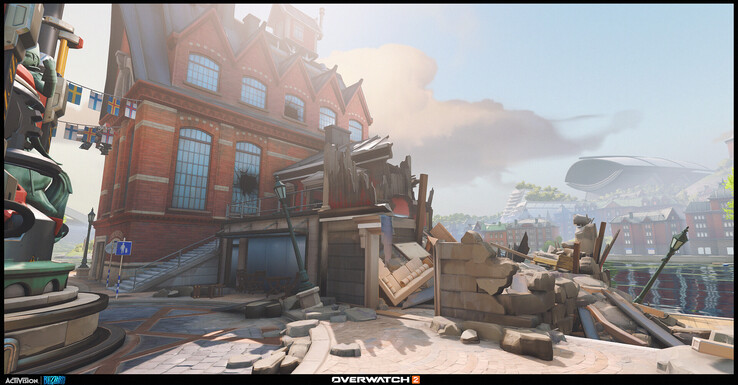 Overwatch 2'deki molozlarla kaplı sokaklar ve kısmen yıkılmış iç mekanlar, oyunun çatışma izleri taşıyan hikaye görev alanlarının arkasındaki çevresel hikaye anlatımını vurguluyor.