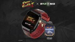 Koyu dokulu bir arka plan önünde, kırmızı kayışlı, altın kaplama detaylara ve ikinci bir saat ekranına sahip Street Fighter II: My Play Watch oyun saati.