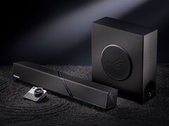 Bu masaüstü hoparlör setinin Çin'deki fiyatı yaklaşık 548 dolardır. Resimde: soundbar, woofer ve kumandayı gösteren bir tanıtım fotoğrafı yer almaktadır.