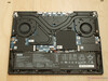 Inside the laptop, the replaceable components are protected by additional covers