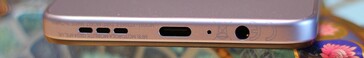 Alt: hoparlör, USB-C bağlantı noktası, mikrofon, 3,5 mm ses jakı