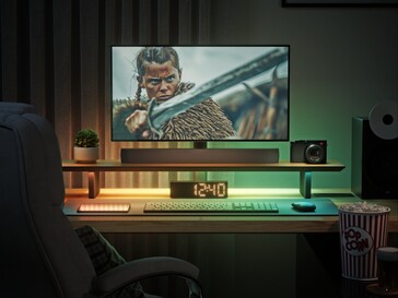 Film izlemek için ortam aydınlatmalı akıllı LED monitör standı.