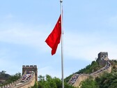 Arka planda Çin Seddi'nin bulunduğu Çin bayrağı