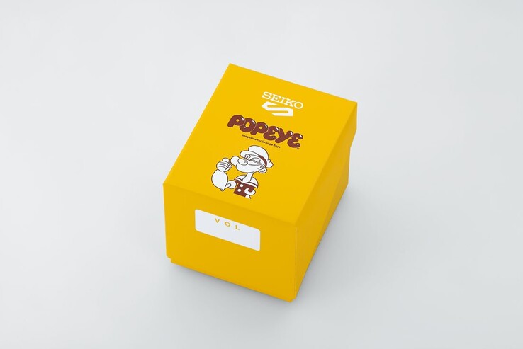 Seiko 5 Sports x Popeye HDB013 modeli için, Popeye logosu ve yıldönümü temalı tasarımların yer aldığı sarı renkli özel baskı sunum kutusu.