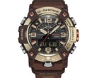 G-Shock Mudmaster GG-B100XMH-5A modelinin açık sarı altın ve kahverengi kasası ile çerçevesini gösteren yakın çekim fotoğrafı.