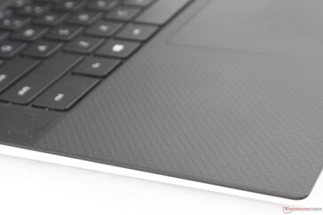 Same carbon fiber palm rests that have come to define the XPS series. Unfortunately, expect instant fingerprint buildup as well