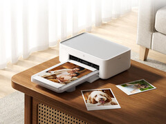 Yeni Desktop Photo Printer 2, Youpin'de yaklaşık 103 dolara satılıyor. Resimde: Yazıcının çalışırken gösterildiği bir tanıtım fotoğrafı.