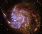 Spiral bir galaksiyi gösteren bir görüntü.