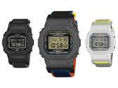 Resimde Casio G-Shock DW-5600MNC-1, DW-5600MNC-BA2 ve DW-5600MNC-7A8 beyaz bir arka plan üzerinde gösterilmiştir.