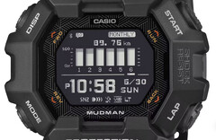 Engebeli bir dağ manzarası önünde kırmızı ve beyaz dijital ekranlı Casio G-Shock Mudman GDG-B100 saat.