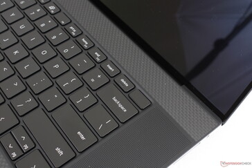Fingerprint-enabled Power button. Speakers grilles are now larger along the sides, but the actual speakers are identical to the XPS 15